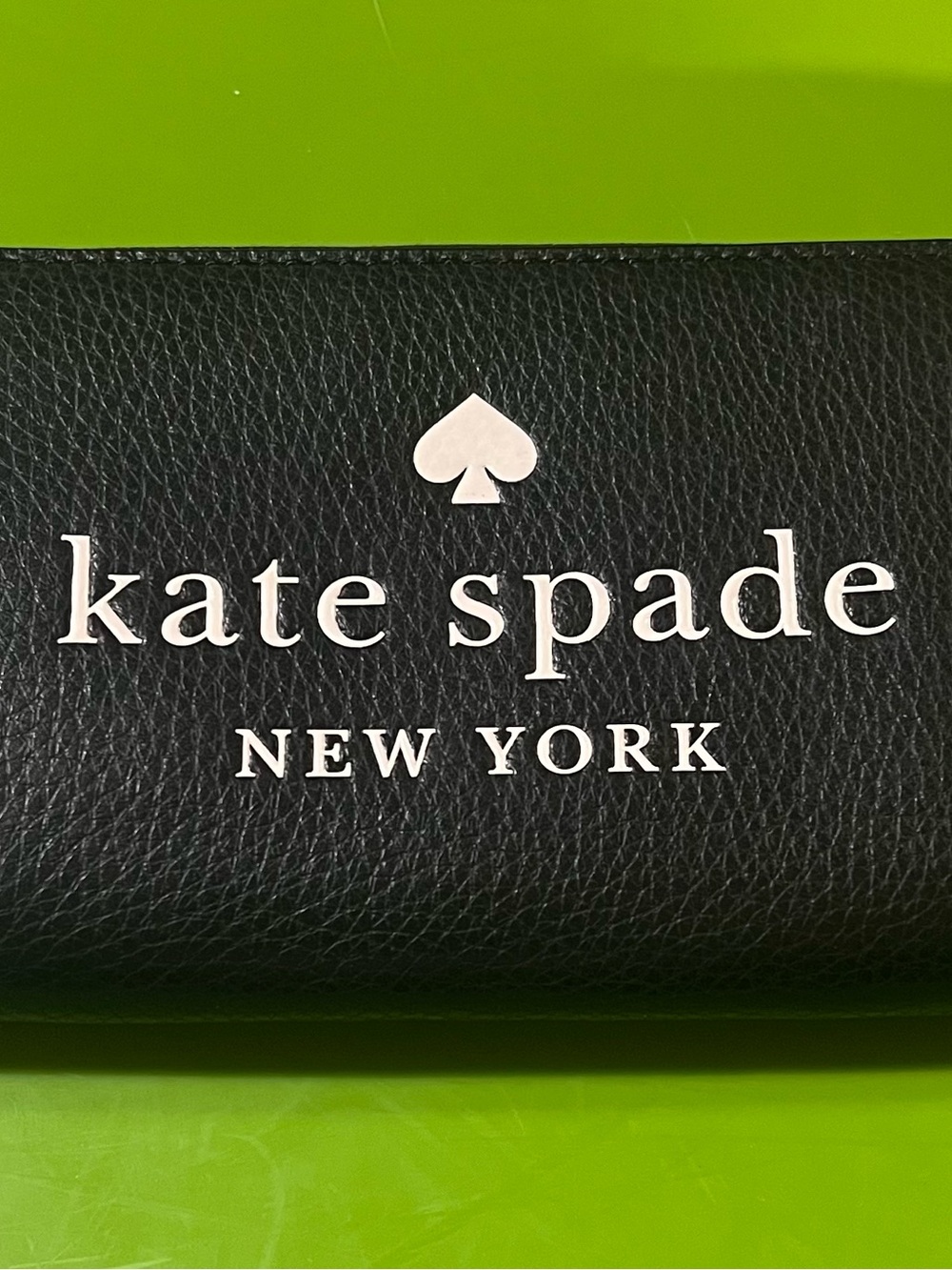 kate spade Black Pebbled Leather Wallet with White Logo